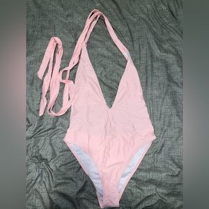 Light pink plunge neck with open back one piece swimsuit